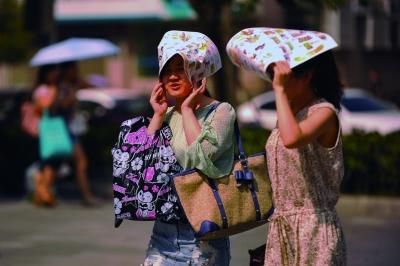 進(jìn)入7月份以來，南京出現(xiàn)了多個高溫天氣。本報資料圖片 劉瀏 攝